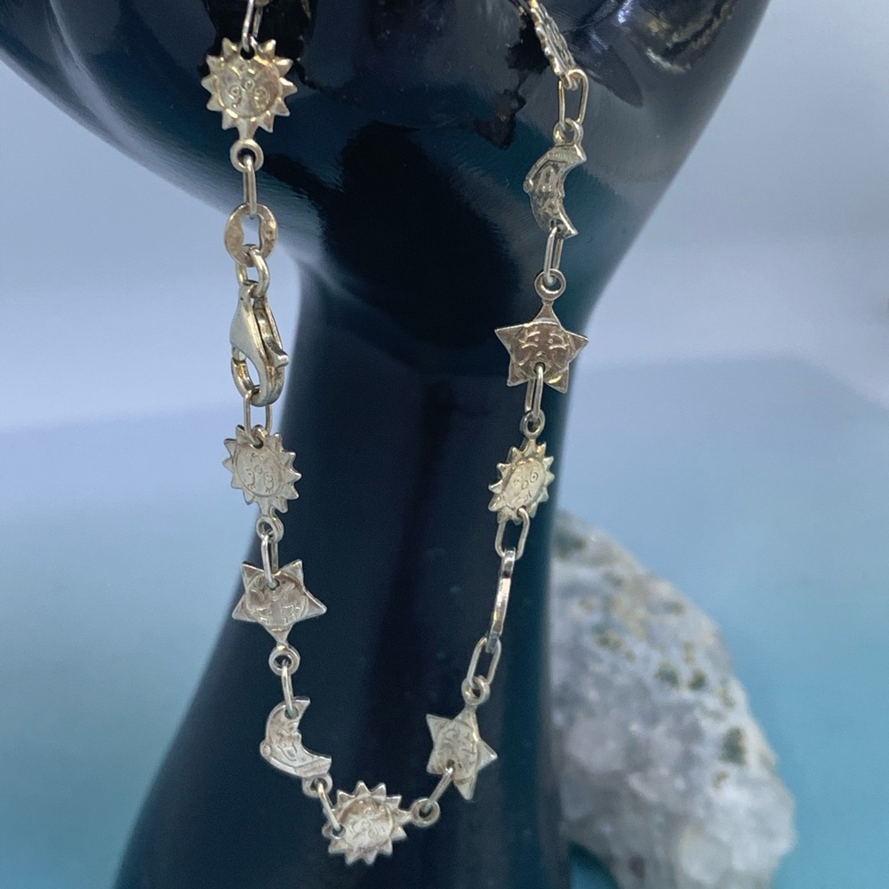 Sterling silver Sun, Moon, and Star bracelet.